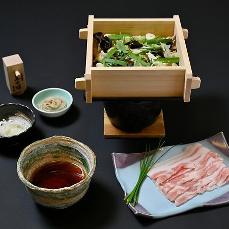 汤元小滨市酒店 日光 外观 照片